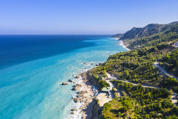 Aerial view of the winding road to Megali Petra beach. Lefkada, Ionian Islands region, Greece.