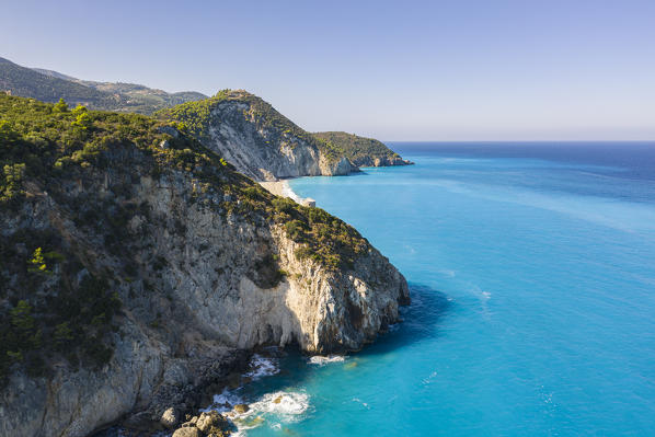 Coastline and tower above Milos Beach, Agios Nikitas, Lefkada, Ionian Islands region, Greece.