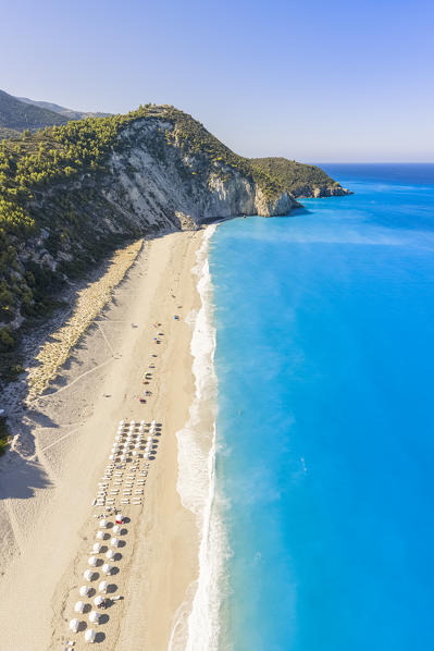 Sunshades on Milos Beach in summer. Agios Nikitas,  Lefkada, Ionian Islands region, Greece.