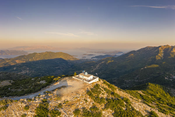 Aerial view of the Orthodox  church of the Prophet Elias at sunset in summer. Lefkada, Ionian Islands region, Greece.