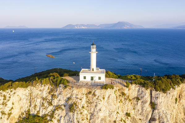 Aerial view of the lighthouse at Cape Lefkatas, with Ithaka island in the background. Lefkada, Ionian Islands region, Greece.