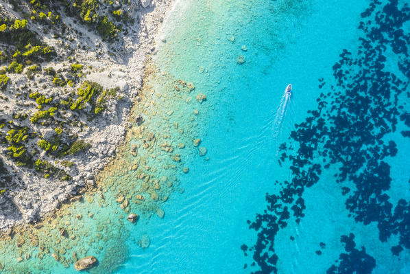 Boat sails on the Mediterranean sea. Lefkada, Ionian Islands region, Greece.