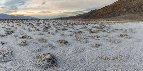 Sunset landscape at Badwater Basin. Death Valley National Park, Inyo County, California, USA.