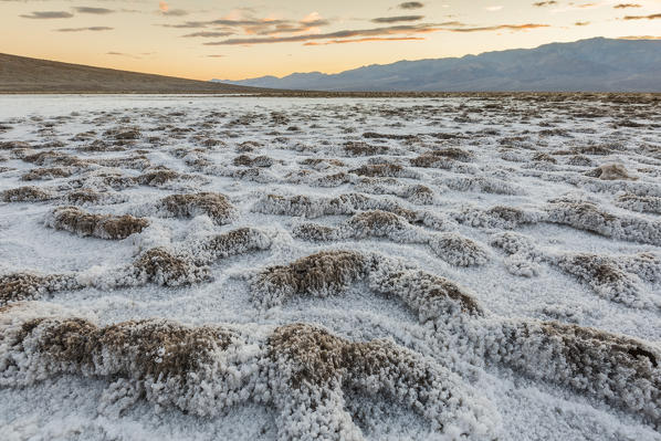 Sunset landscape at Badwater Basin. Death Valley National Park, Inyo County, California, USA.