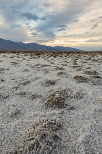 Sunset landscape at Badwater Basin. Death Valley National Park, Inyo County, California, USA.