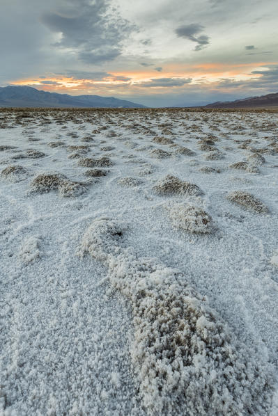 Sunset landscape at Badwater Basin. Death Valley National Park, Inyo County, California, USA.