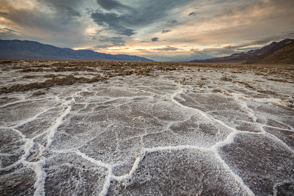 Sunset landscape at Badwater Basin. Death Valley National Park, Inyo County, California, USA.