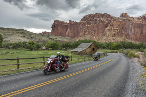 Motorbikes along the road of Fruita ghost town. Teasdale, Capitol Reef Naional Park, Wayne County, Utah, USA.