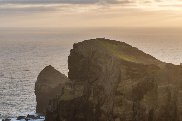 People on the lookout at Point of Saint Lawrence at dawn. Canical, Machico district, Madeira region, Portugal.