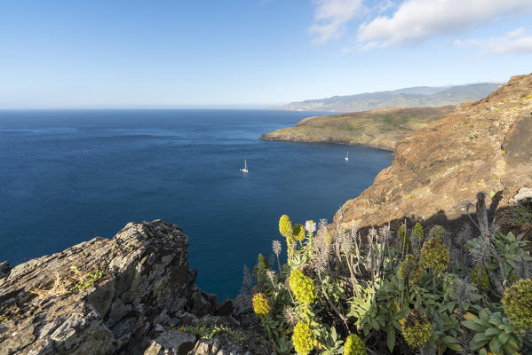 Boats sailing on the Atlantic Ocean at Point of St Lawrence. Canical,  Machico district, Madeira region, Portugal.