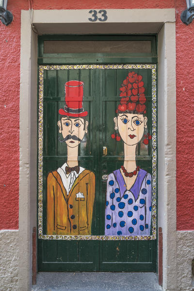 Painted doors in Santa Maria street for the Art of Open Doors project. Funchal, Madeira region, Portugal.