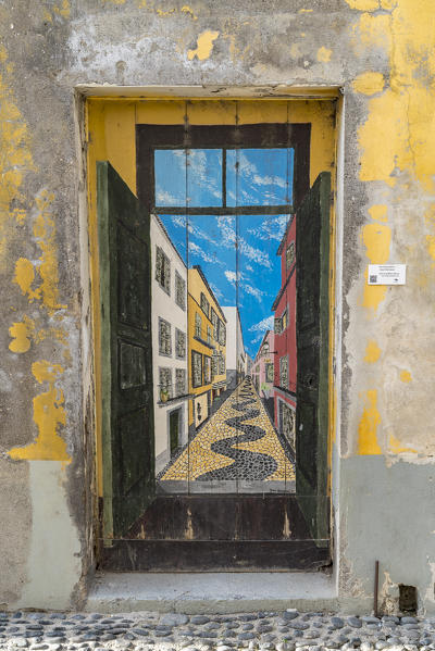 Painted doors in Santa Maria street for the Art of Open Doors project. Funchal, Madeira region, Portugal.