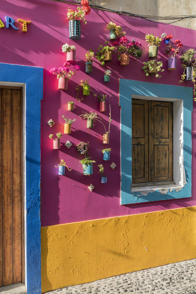 Painted door, window and walls for the Art of Open Doors project in Santa Maria street. Funchal, Madeira region, Portugal.