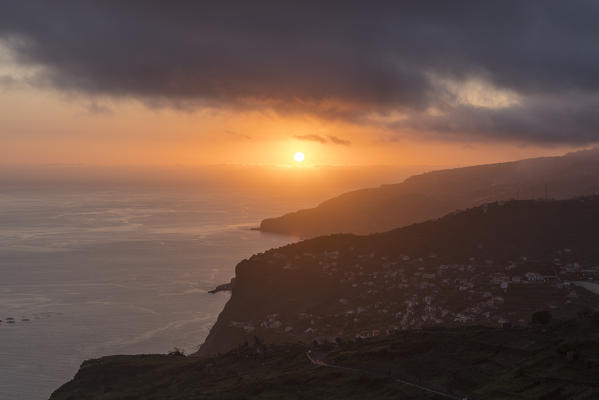 The village of Campanario and, in the background, Ribeira Brava at sunset. Madeira region, Portugal.