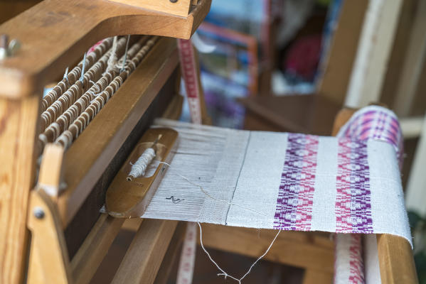 Traditional loom and fabric in the Old Town. Funchal, Madeira region, Portugal.