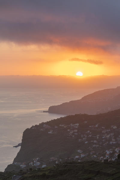 The village of Campanario and, in the background, Ribeira Brava at sunset. Madeira region, Portugal.