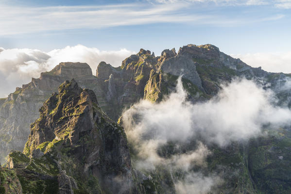 Mist on the peaks from Vereda do Areeiro. Pico do Arieiro, Funchal, Madeira region, Portugal.