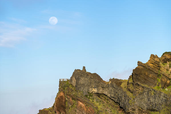 Full moon above Nino da Manta lookout. Pico do Arieiro, Funchal, Madeira region, Portugal.