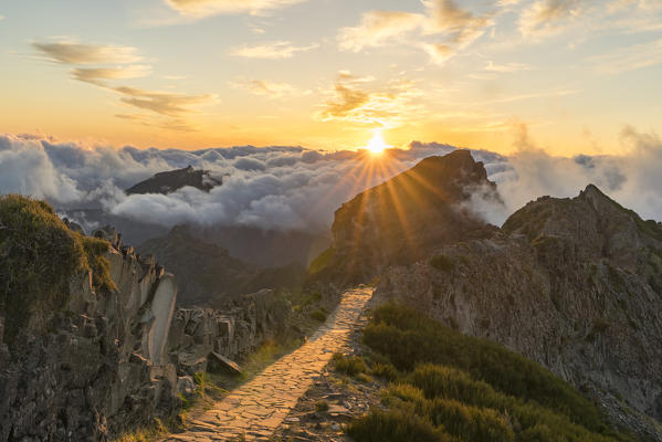 Sunset over Vereda do Areeiro, the trail that links Pico Ruivo to Pico do Arieiro. Funchal, Madeira region, Portugal.