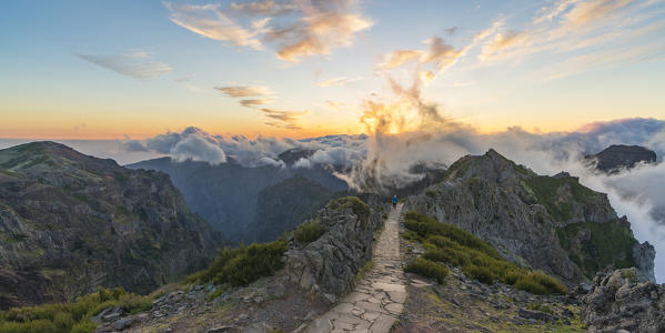 Sunset over Vereda do Areeiro, the trail that links Pico Ruivo to Pico do Arieiro. Funchal, Madeira region, Portugal.