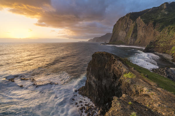 Faial beach and its cliffs at sunrise. Faial, Santana municipality, Madeira region, Portugal.