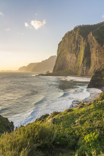 Cliffs and waves on Faial beach at dawn. Faial, Santana municipality, Madeira region, Portugal.