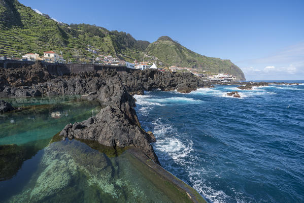 Natural pools and the village of Porto Moniz, Madeira region, Portugal.