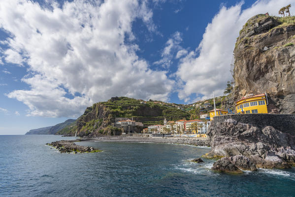 The town of Ponta do Sol with its beach and pier. Madeira region, Portugal.