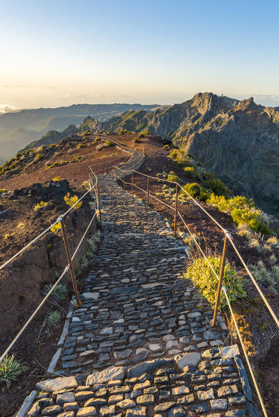 The trail from the top of Pico Ruivo with Pico do Areeiro in the background. Achada do Teixeira, Santana municipality, Madeira region, Portugal.