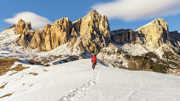 Photographer looking at the mountains. Europe, Italy, Veneto, Belluno province