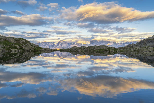 The mountains of the Adamello Brenta Park reflected in the Nero lake.
Europe, Italy, Trentino, Nambrone valley, Sant'Antonio di Mavignola