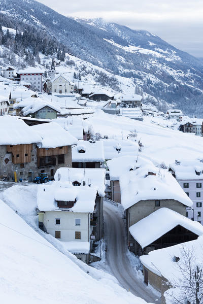 Fraviano village in winter season.
Europe, Italy, Trentino Alto Adige, Sun valley, Vermiglio municipality, Trento province