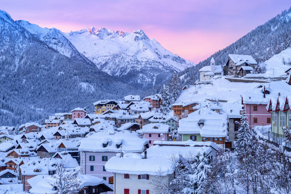 Vermiglio at sunrise in winter season.
Europe, Italy, Trentino Alto Adige, Trento province, Sun valley, Vermiglio