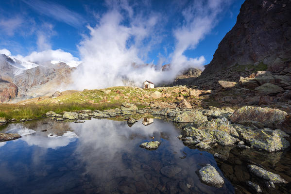 Pond at Larcher refuge
Europe, Italy, Trentino region, Venezia valley, Sun valley, Pejo, national park Stelvio
