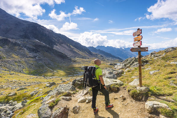 Alpine signage leading to the Careser Lake
Europe, Italy, Trentino region, Venezia Valley, Sun valley, Pejo, National park Stelvio