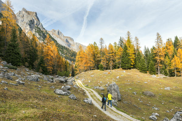 Tourists during a trekking in the Brenta Dolomites
Europe, Italy, Trentino Alto Adige, Trento district, Ville d'Anaunia, Non valley