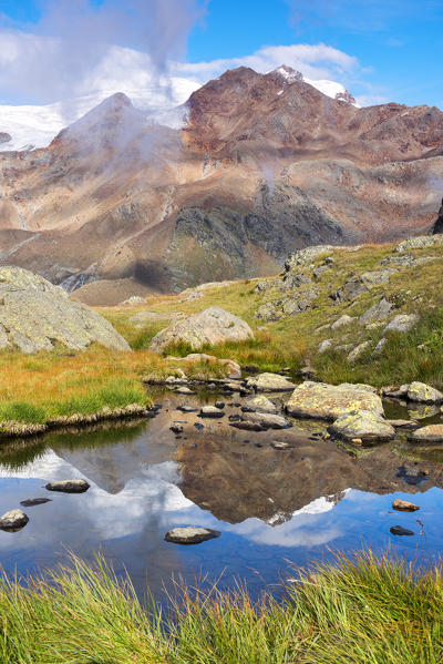 Alpine lake in mountain group Ortles - Cevedale
Europe, Italy, Trentino Alto Adige, Sun valley, Pejo district