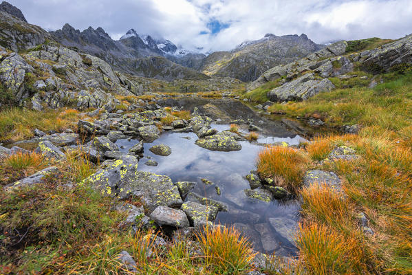 Small lake on the Rhaetian Alps 
Europe, Italy, Trentino, Nambrone valley, Madonna di Campiglio, Sant'Antonio di Mavignola