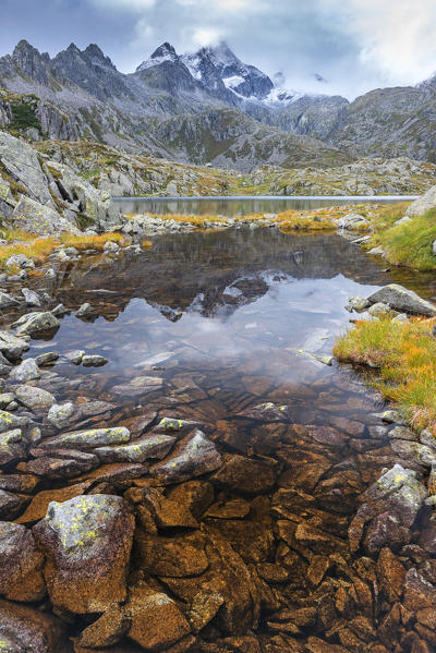 Rhaetian Alps reflected on the small alpine lake
Europe, Italy, Trentino, Madonna di Campiglio, Nambrone valley