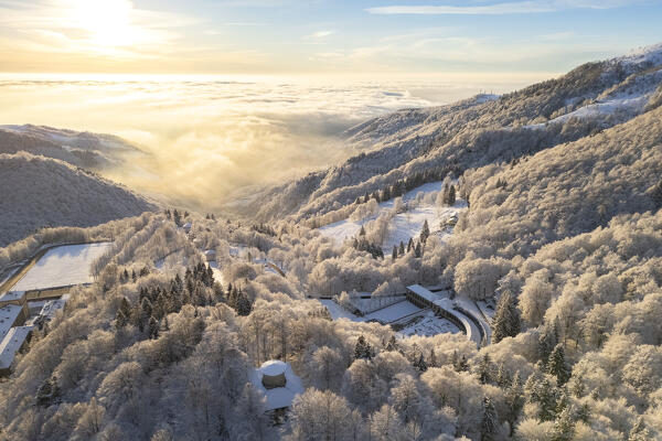 Aerial view of the Sanctuary of Oropa in winter at dawn. Biella, Biella district, Piedmont, Italy, Europe.