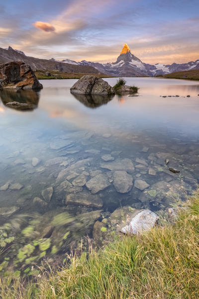 Dawn on the shores of Stellisee Lake, Zermatt, Switzerland.