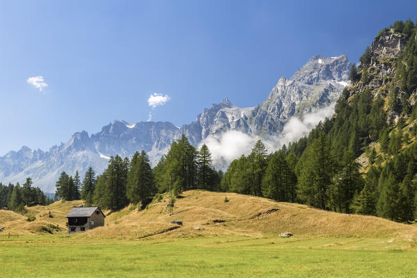 A small hut near Crampiolo and monte Cervandone in a summer day, Alpe Devero, Antigorio valley, Piedmont, Italy.