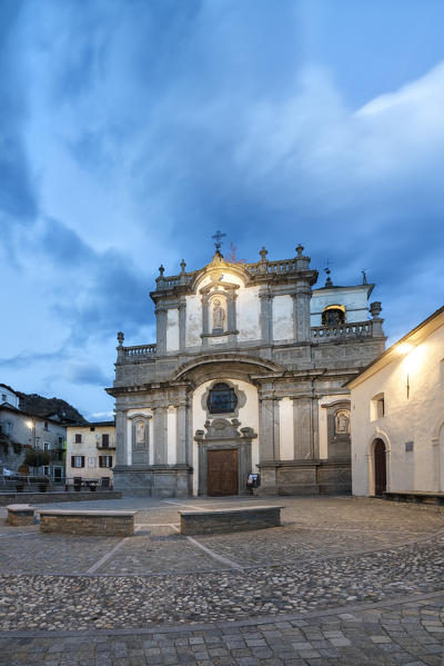 Medieval church of Caspano at dusk, Costiera dei Cech, Sondrio province, lower Valtellina, Lombardy, Italy