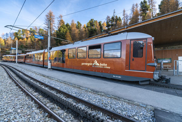 The iconic red Gornergrat Bahn train at Zermatt railway station, canton of Valais, Switzerland