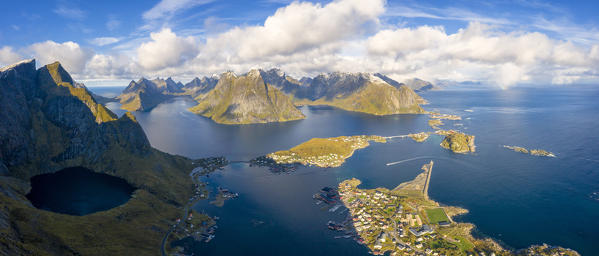 Panoramic aerial view of Reine Bay from the rocky peak of Reinebringen, Moskenes, Nordland, Lofoten Islands, Norway