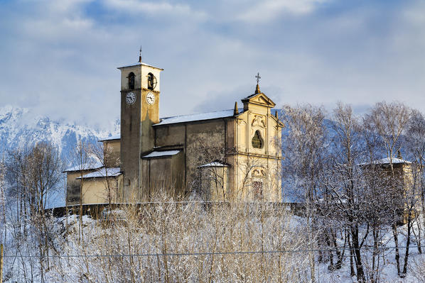 Old church of Sant'Andrea surrounded by snow, Civo, Costiera dei Cech, Sondrio province, Valtellina, Lombardy, Italy