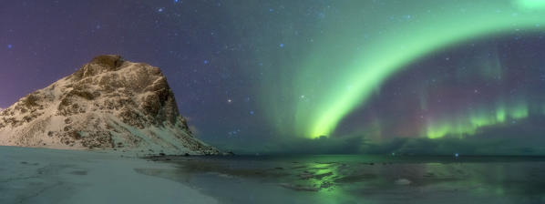 Panoramic of Northern Lights over Uttakleiv beach, Vestvagoy, Nordland, Lofoten Islands, Norway