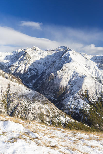 Snowy peaks of Monti Lariani seen from Bodone, Gravedona, Lake Como, Lombardy, Italy