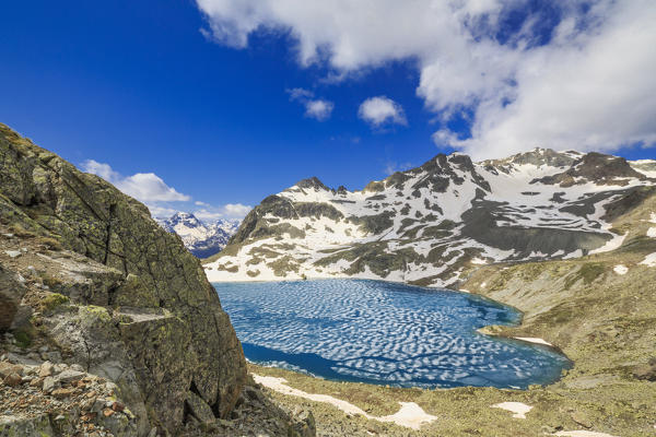 Lej da la Tscheppa during spring thaw, St. Moritz, Engadin, canton of Graubunden, Switzerland