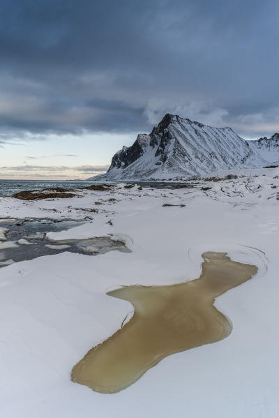 Sand beach covered with snow, Vikten, Flakstad Municipality, Nordland, Lofoten Islands, Norway